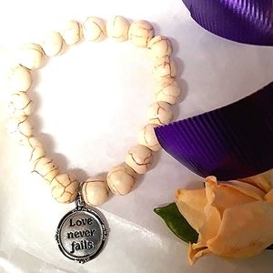 CUTE Charm Bracelet  Silver "Love never fails" Charm  Cream Crackle Beads NEW